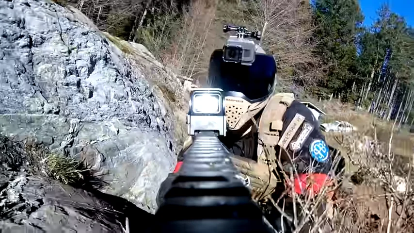 Young players geared up to play paintball at a field