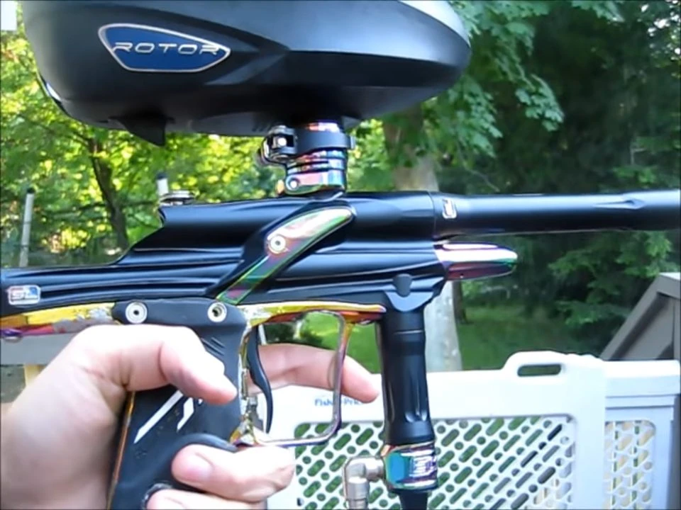 An electronic paintball marker set to a ramping firing mode