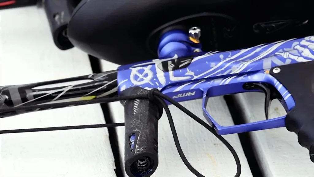 A paintball marker showing its main parts