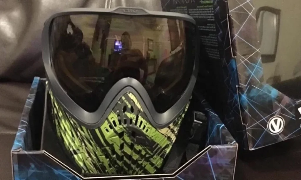Applying anti-fog coating to a paintball mask lens