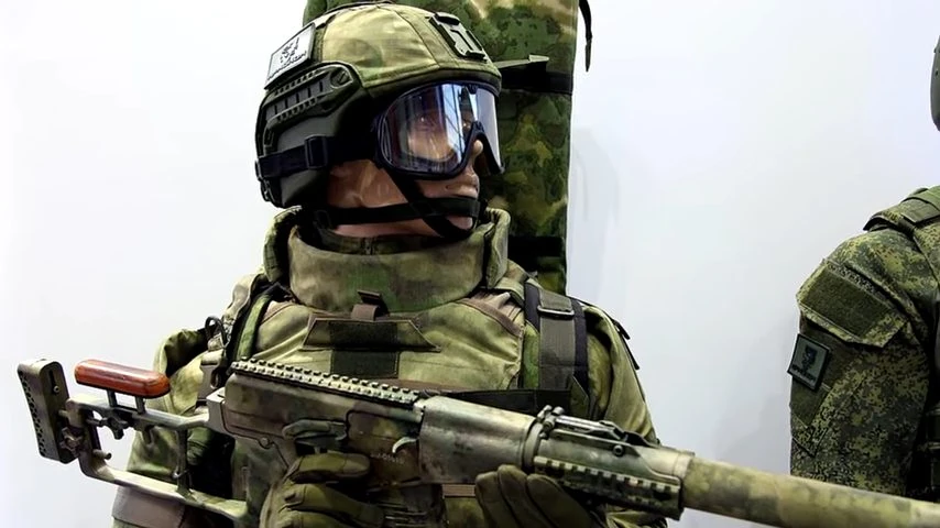 A clear paintball mask lens that resists fogging