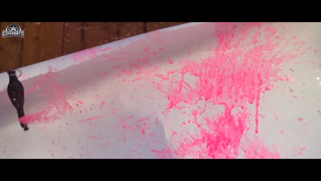 A smoke grenade providing cover on a paintball field
