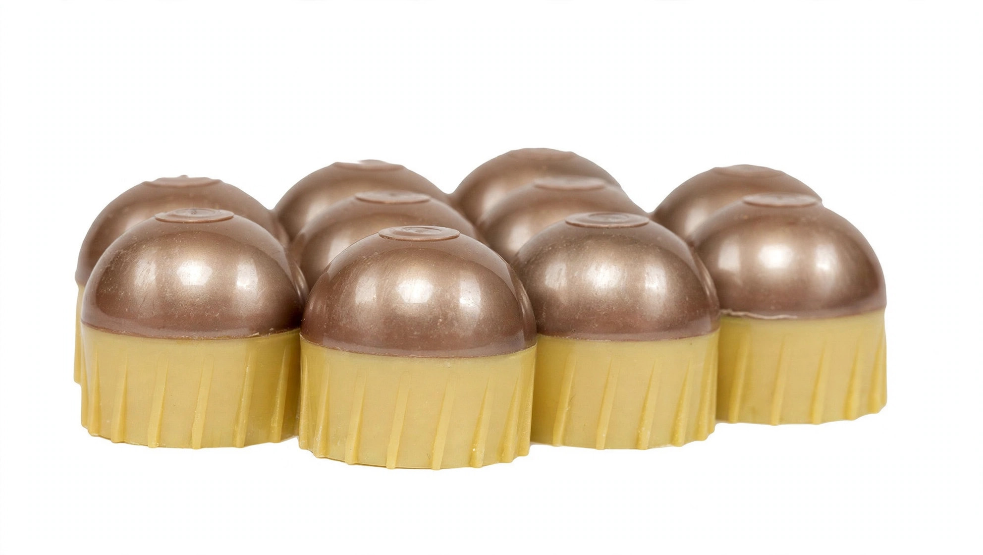 Close-up of First Strike fin-stabilized shaped paintball rounds with brass shells and yellow fins