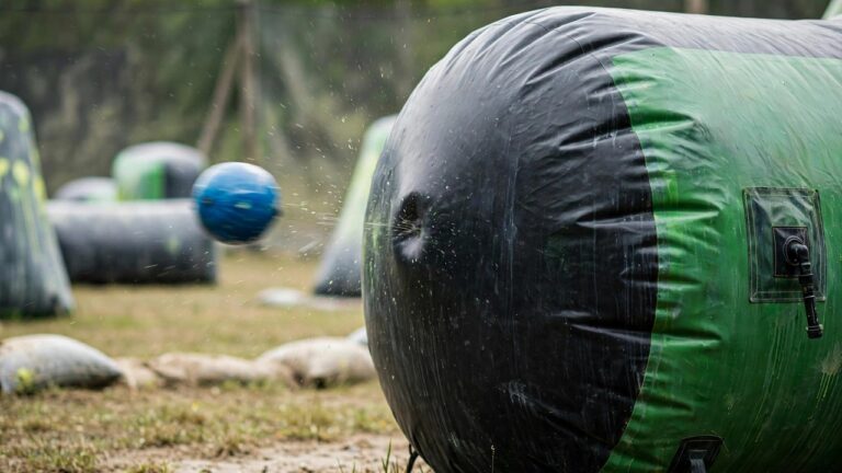 High-speed photo of a paintball bouncing off an inflatable paintball bunker intact